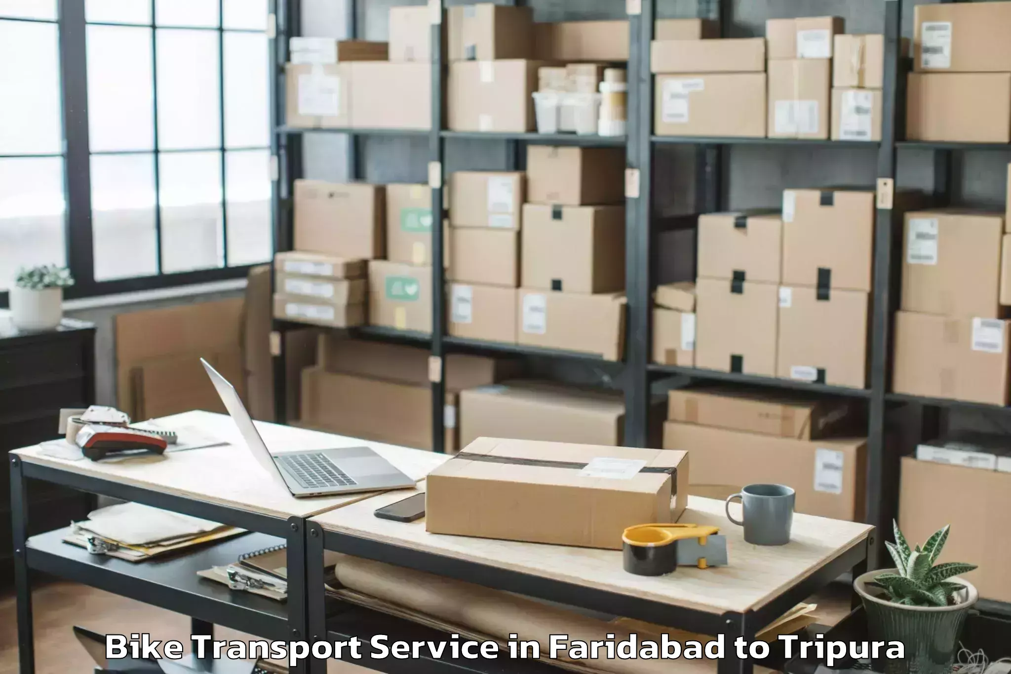 Book Faridabad to Belonia Bike Transport